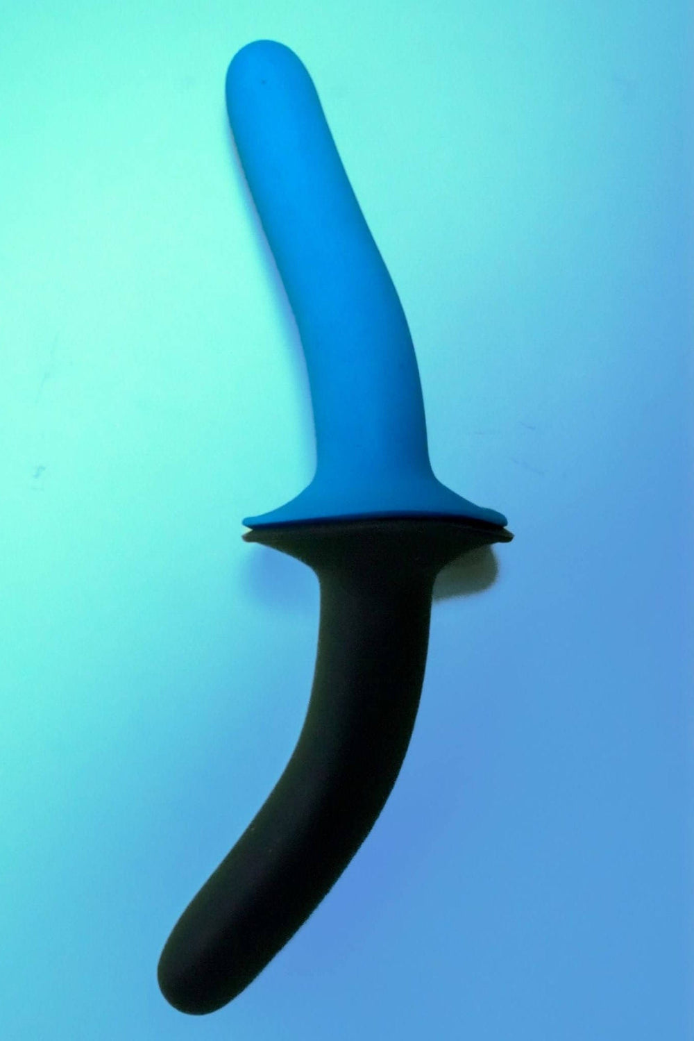 Blue and black object on a gradient blue background