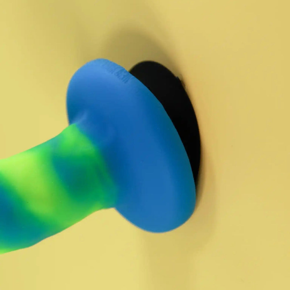 Double-sided suction cup toy mount, side view, by New York Toy Collective