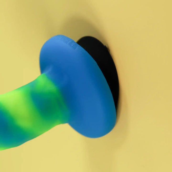 Double-sided suction cup toy mount, side view, by New York Toy Collective