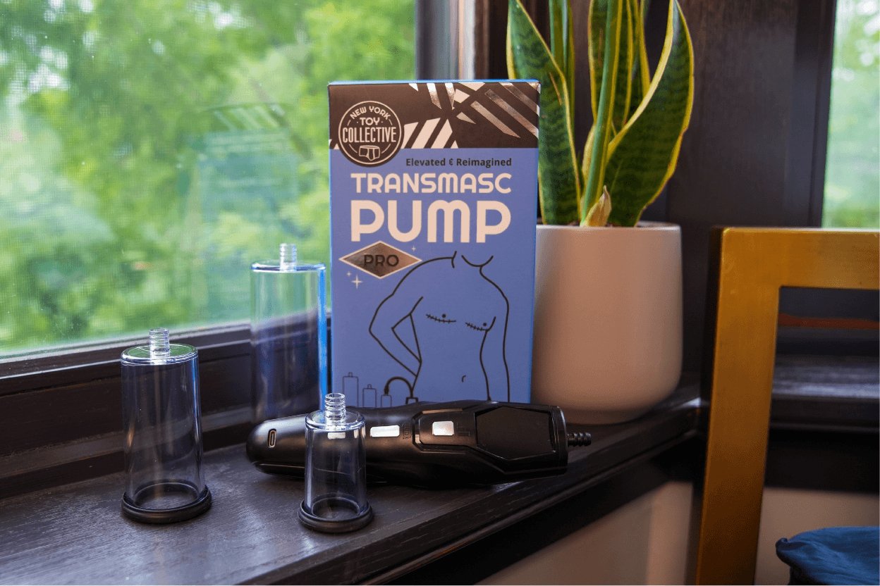 Transmasc Pump packaging on a surface with a plant and window in the background