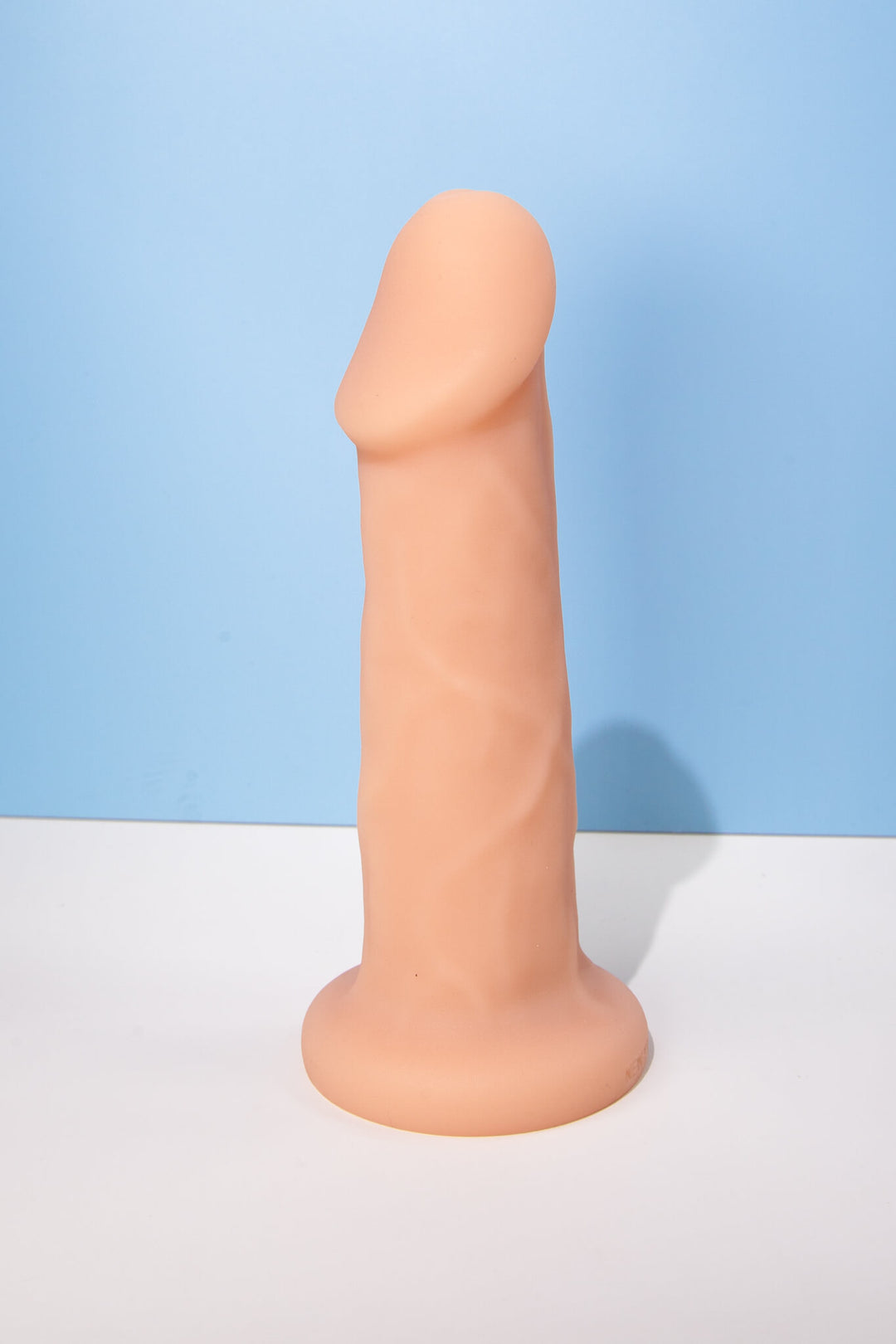 Carter posable pack and play toy shown in cashew design by New York Toy Collective 