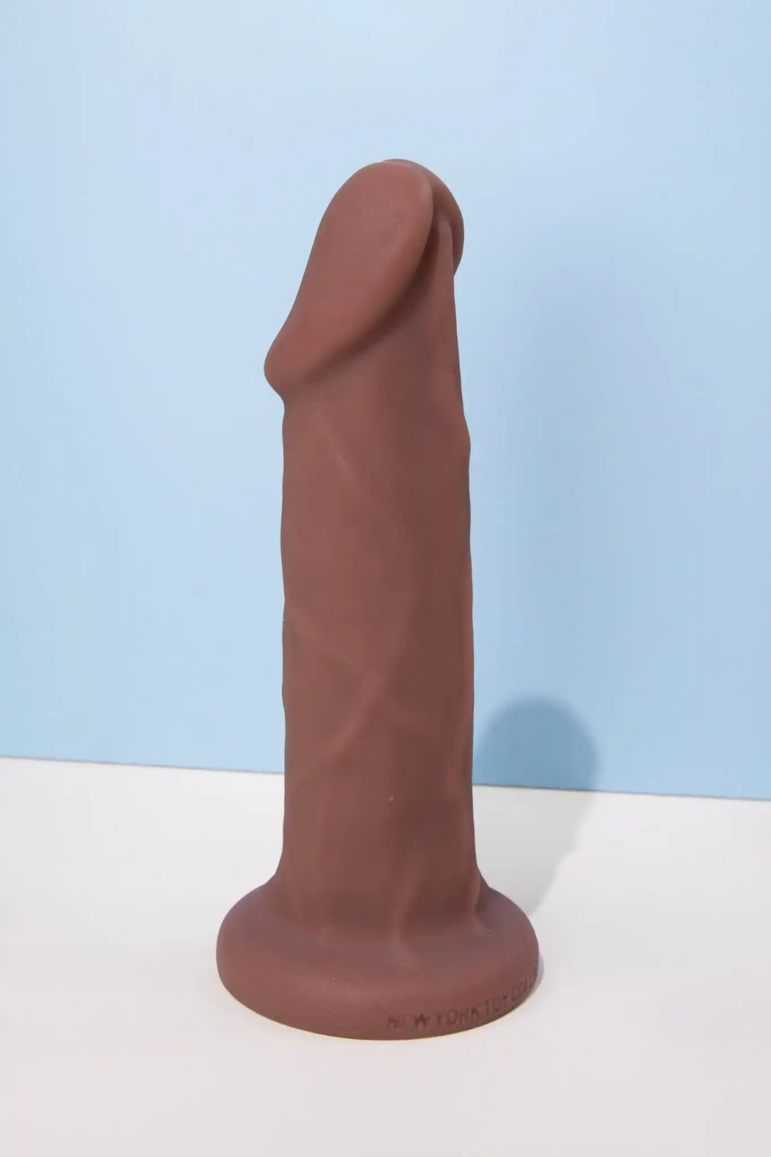Carter realistic pack and play toy with posable shown in hazelnut design by New York Toy Collective